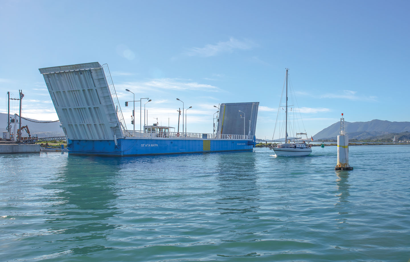Entrance to Lefkada | Floating bridge raises to allow the boat's passing